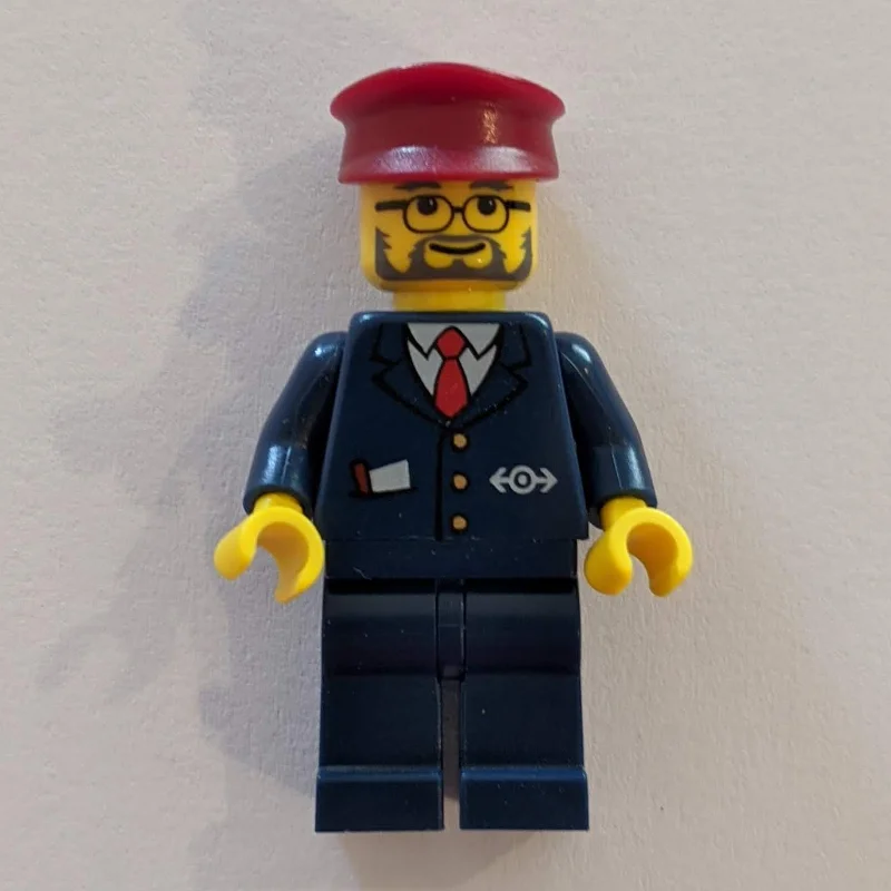 Conductor - Dark Blue Jacket, Dark Blue Legs, Dark Red Hat, Glasses, Beard
